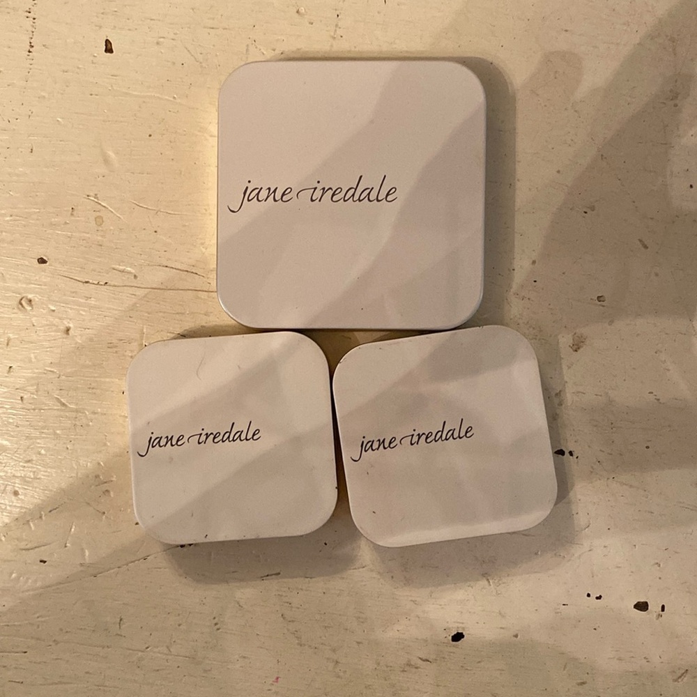 Jane Iredale refillable compacts.